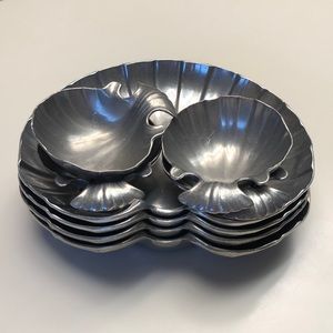 Set of shell pewter dishes
